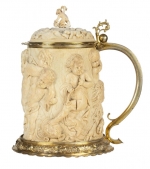 Ivory tankard with relief of Bacchic figures and revellers playing musical instruments.  c.1730. From the Partners’ Room in old New Court.