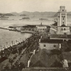 'The National Section of the Exhibition. View from the "Dome of Jewels" - the highest building in the Exhibition - over a part of the National Section. H.M.S. "Hood" & "Repulse" can be seen in the harbour.'